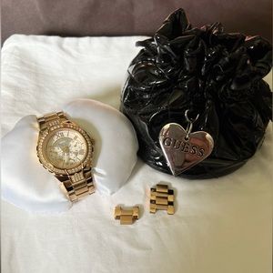 Guess watch, comes with original bag it was purchased with and extra links